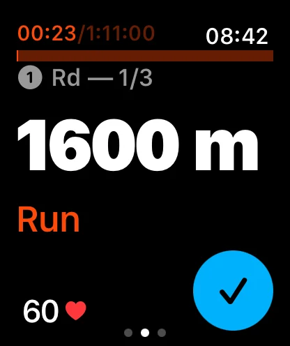 Apple Watch showing the workout timer and heart rate mid-session